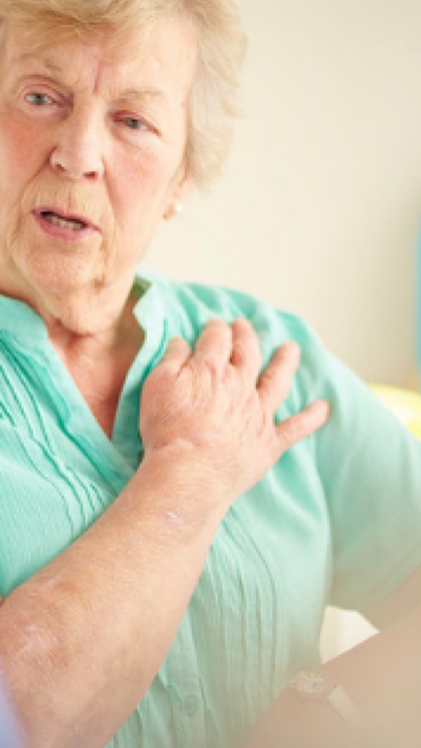 woman pointing her arm with medical professional