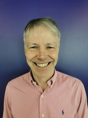 Portrait photo of a man smiling