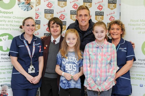 Darren Fletcher, with children and nurses